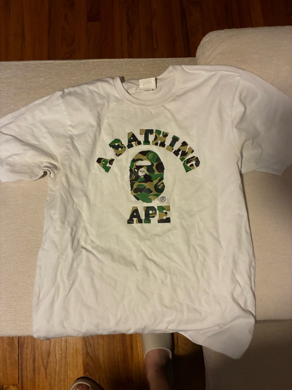 SOLD ELSEWHERE A Bathing Ape White Short Sleeve Tee with Green Camo Logo